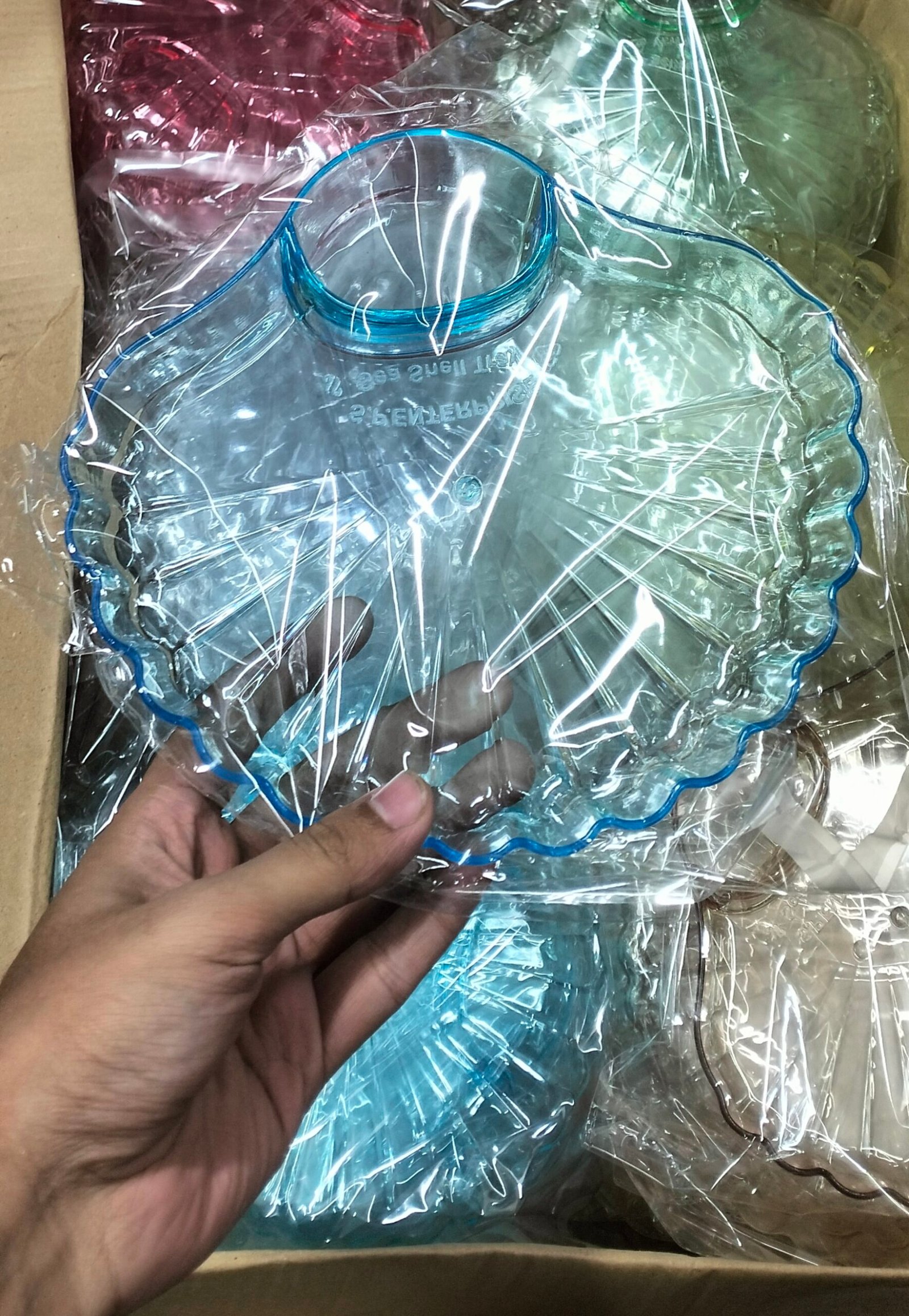shell-shaped turquoise acrylic party plate